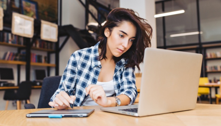 Student Apply Girl on her laptop